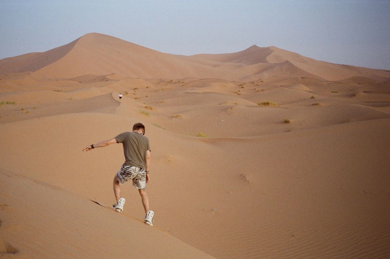 Sandboarding on the Golden Dunes